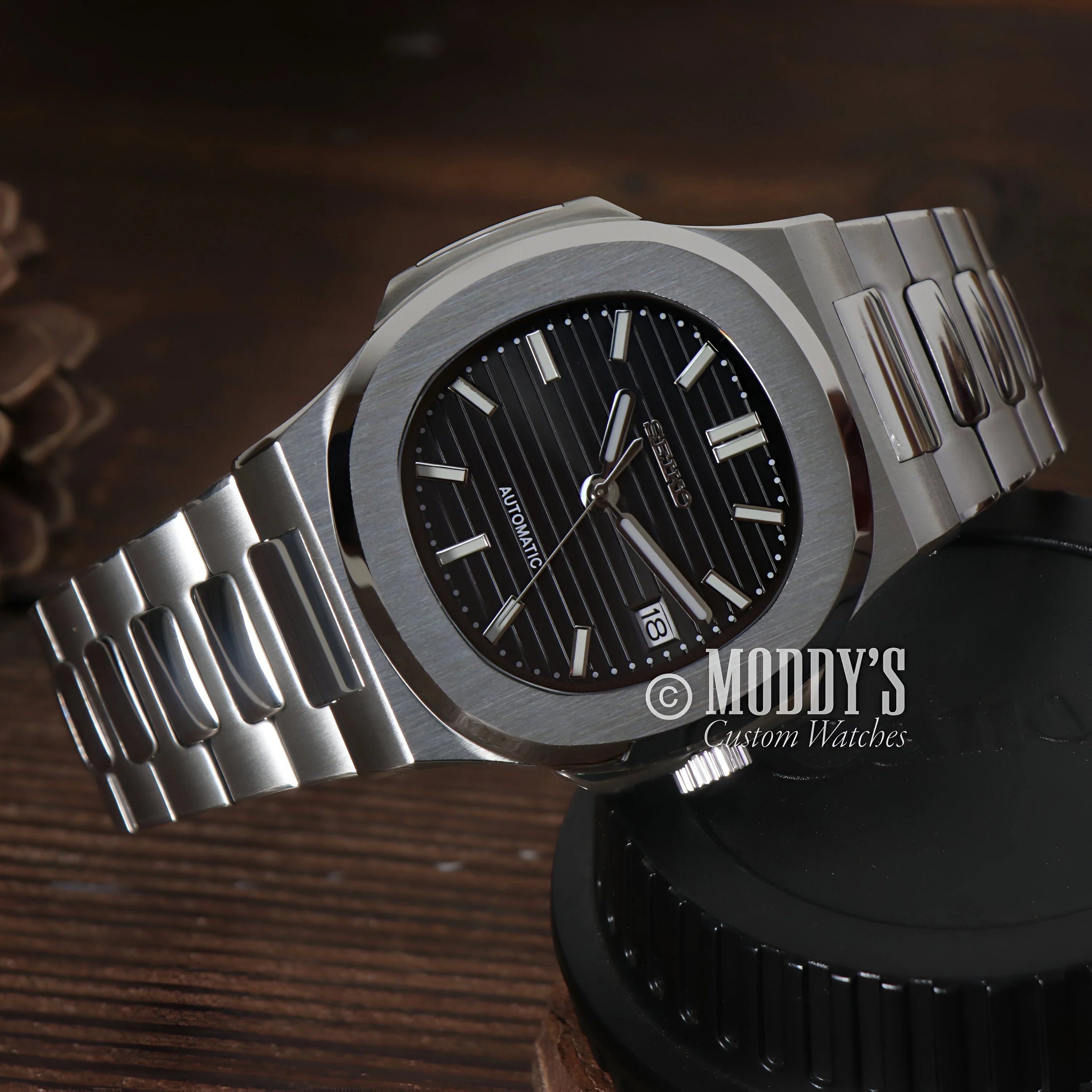 Stainless steel Patek Philippe Nautilus watch in Nautiko Black, perfect for Seiko mod Nautilus