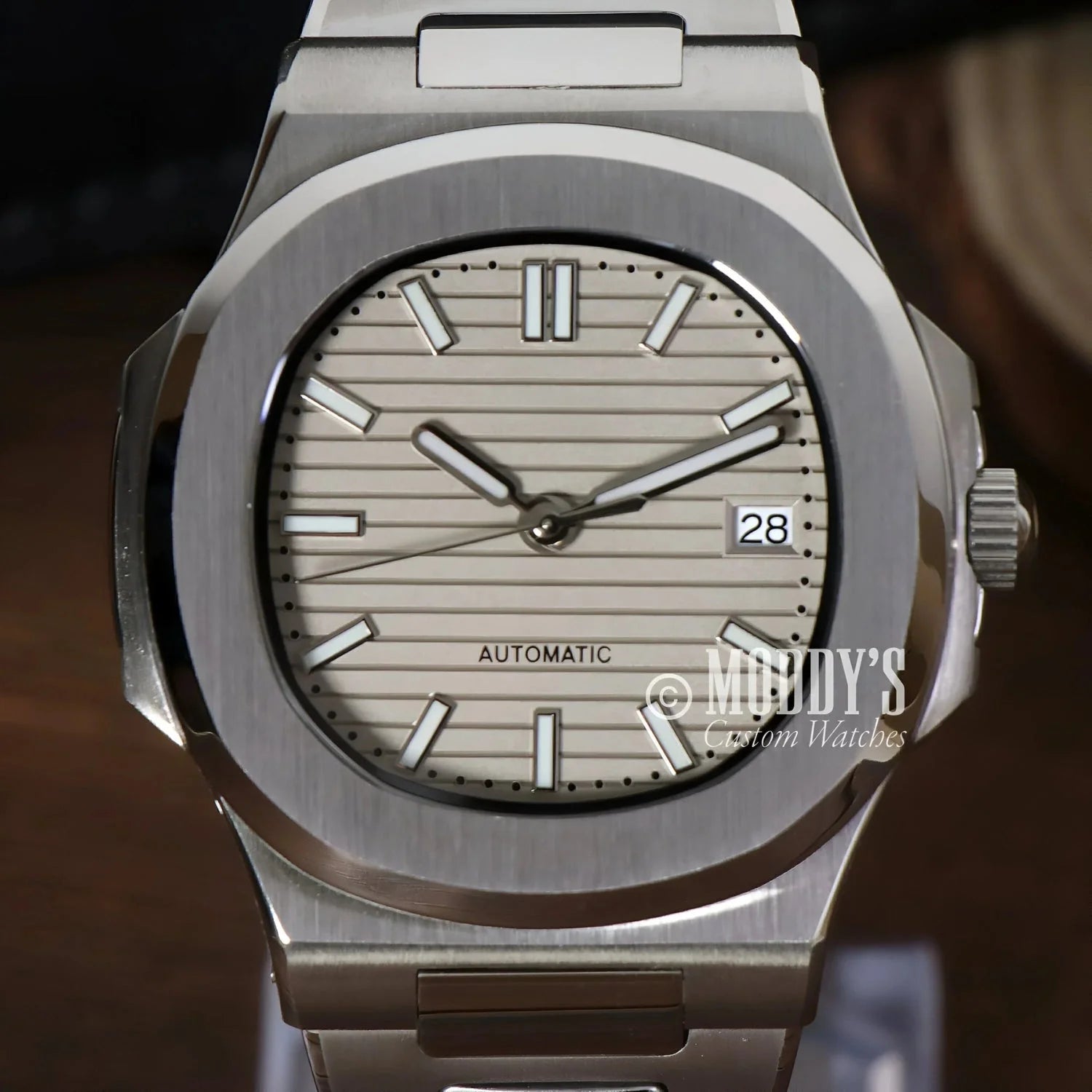 Silver automatic wristwatch featuring NH35 automatic movement from Nautiko Cream collection