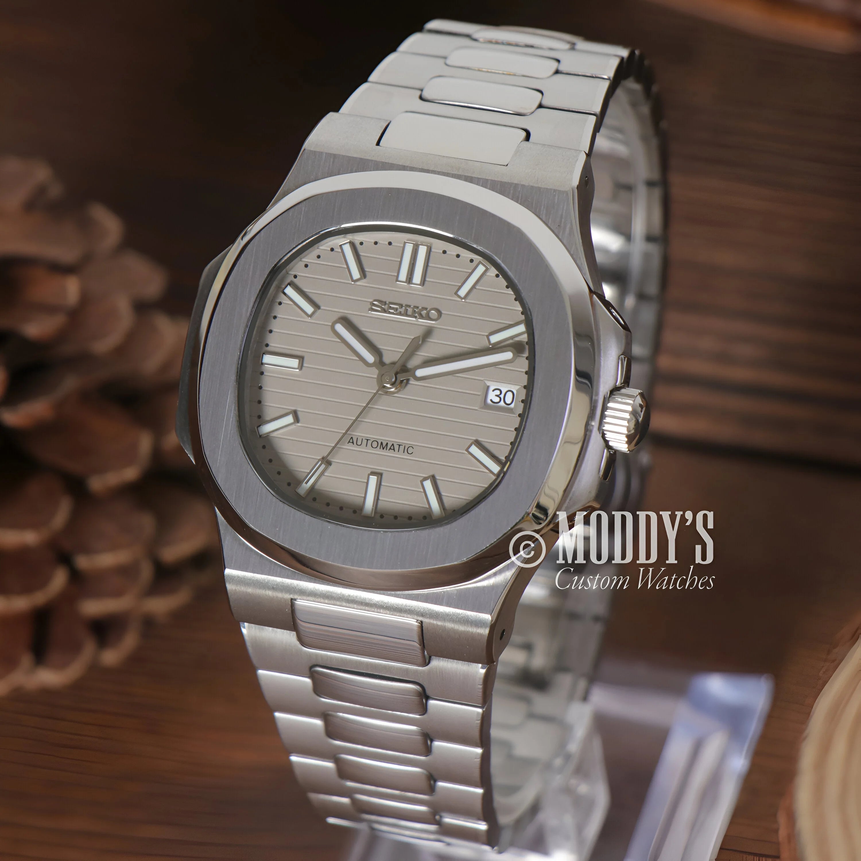 Stainless steel Patek Philippe Nautilus watch with gray dial in Nautiko Cream design