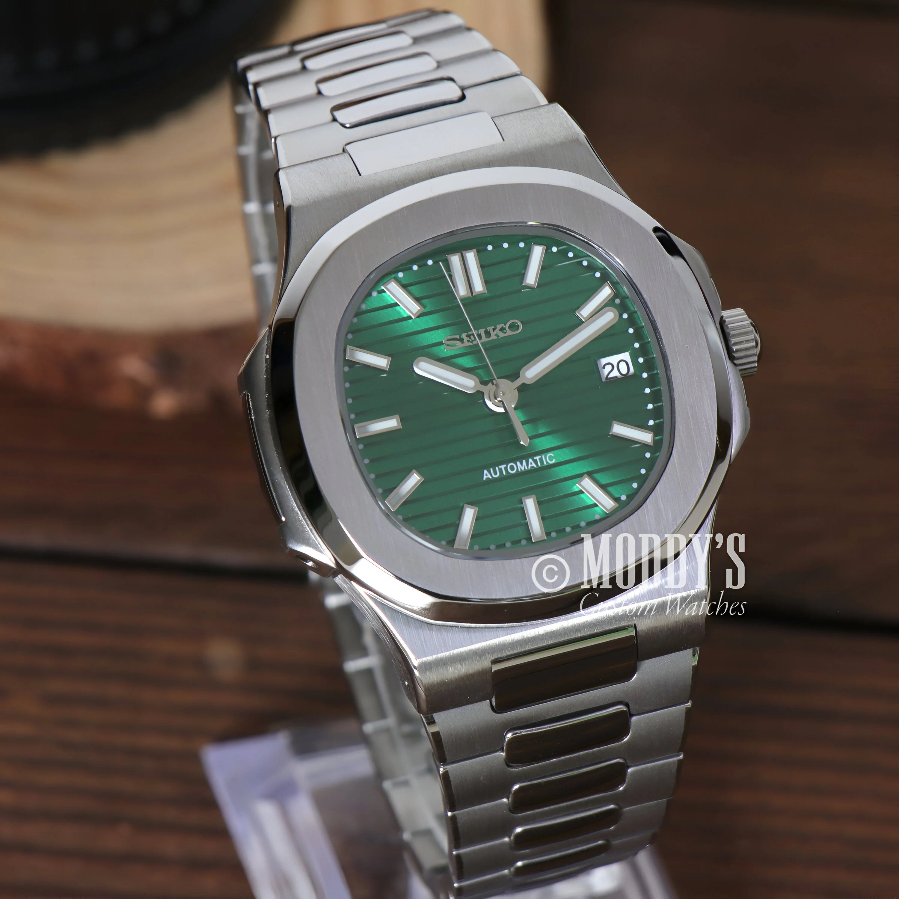 Stainless steel Nautiko Metallic Green wristwatch with a green dial and integrated bracelet