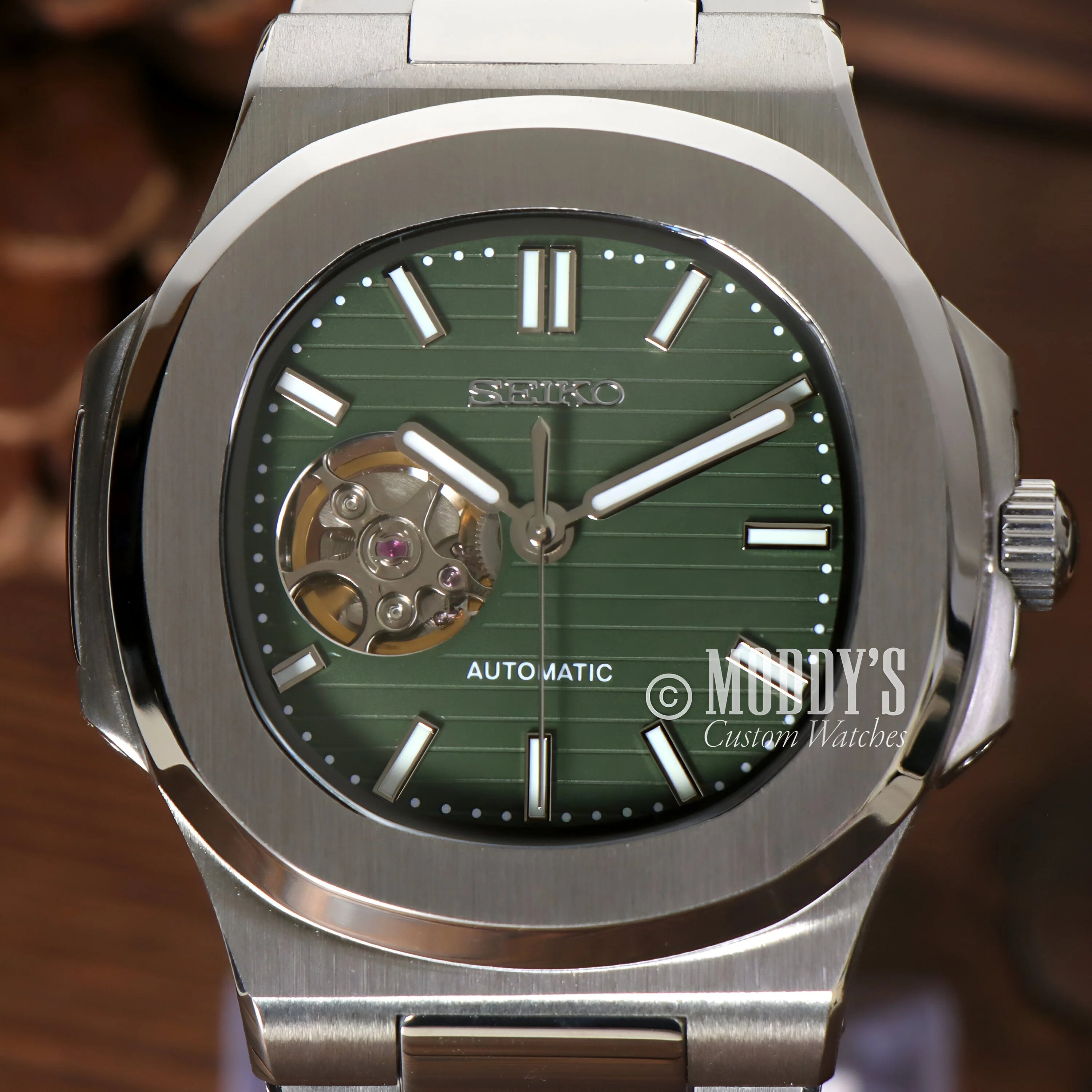 Luxury Nautiko Olive Green Open Movement wristwatch featuring stainless steel case and seiko mod