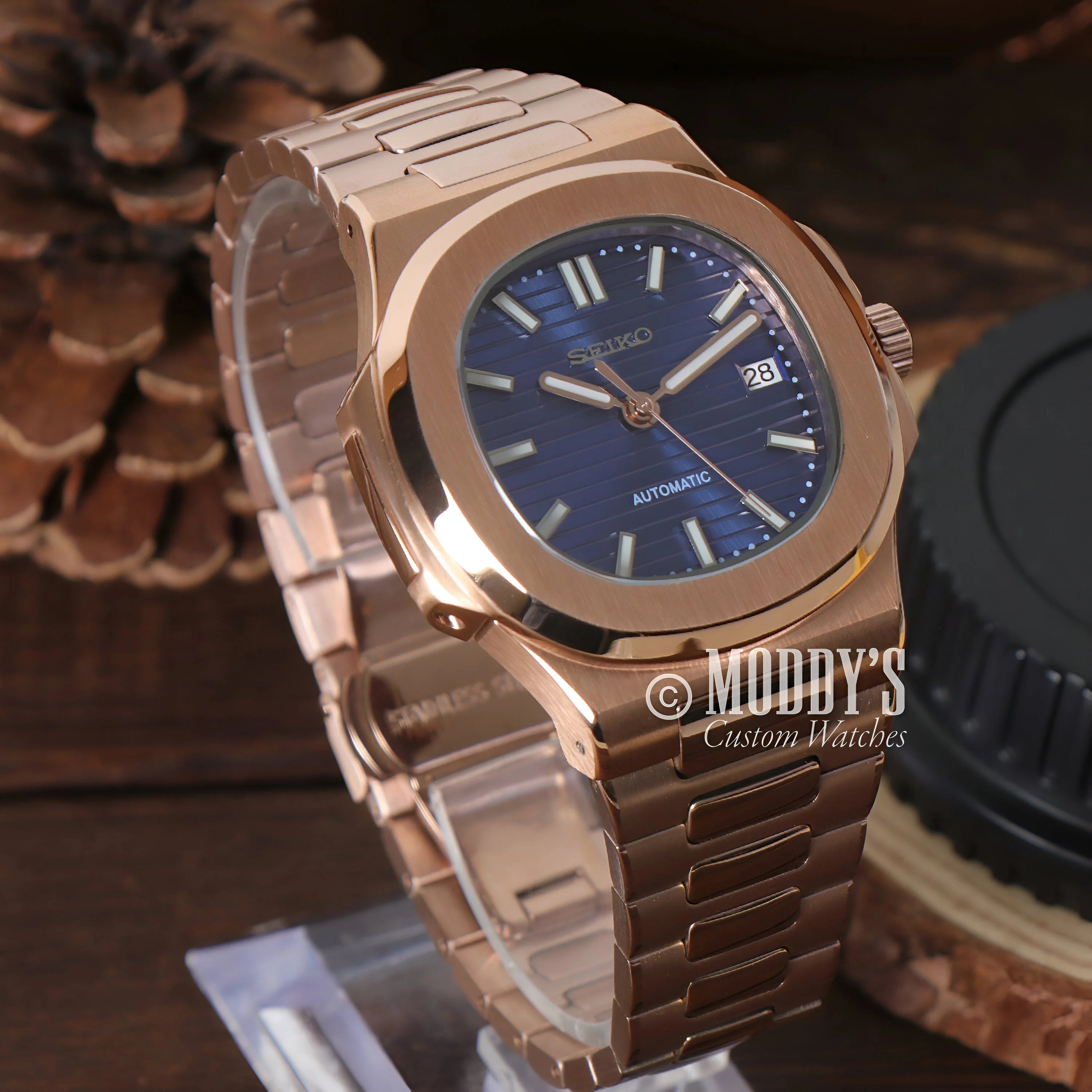 Elegant Nautiko Rose Gold Royal Blue watch featuring blue dial and integrated bracelet