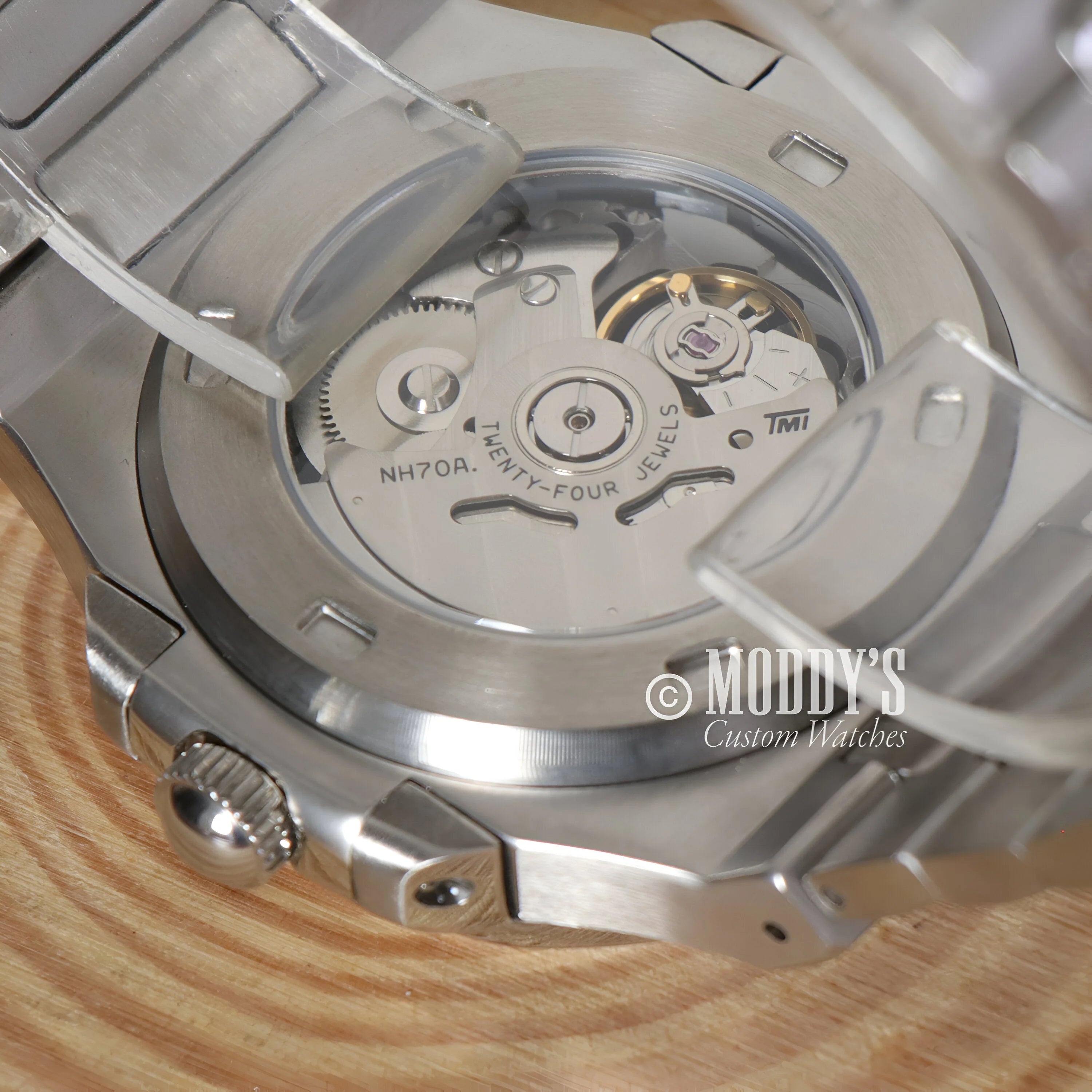 Mechanical watch movement of Nautiko Skeleton with NH70 automatic movement visible