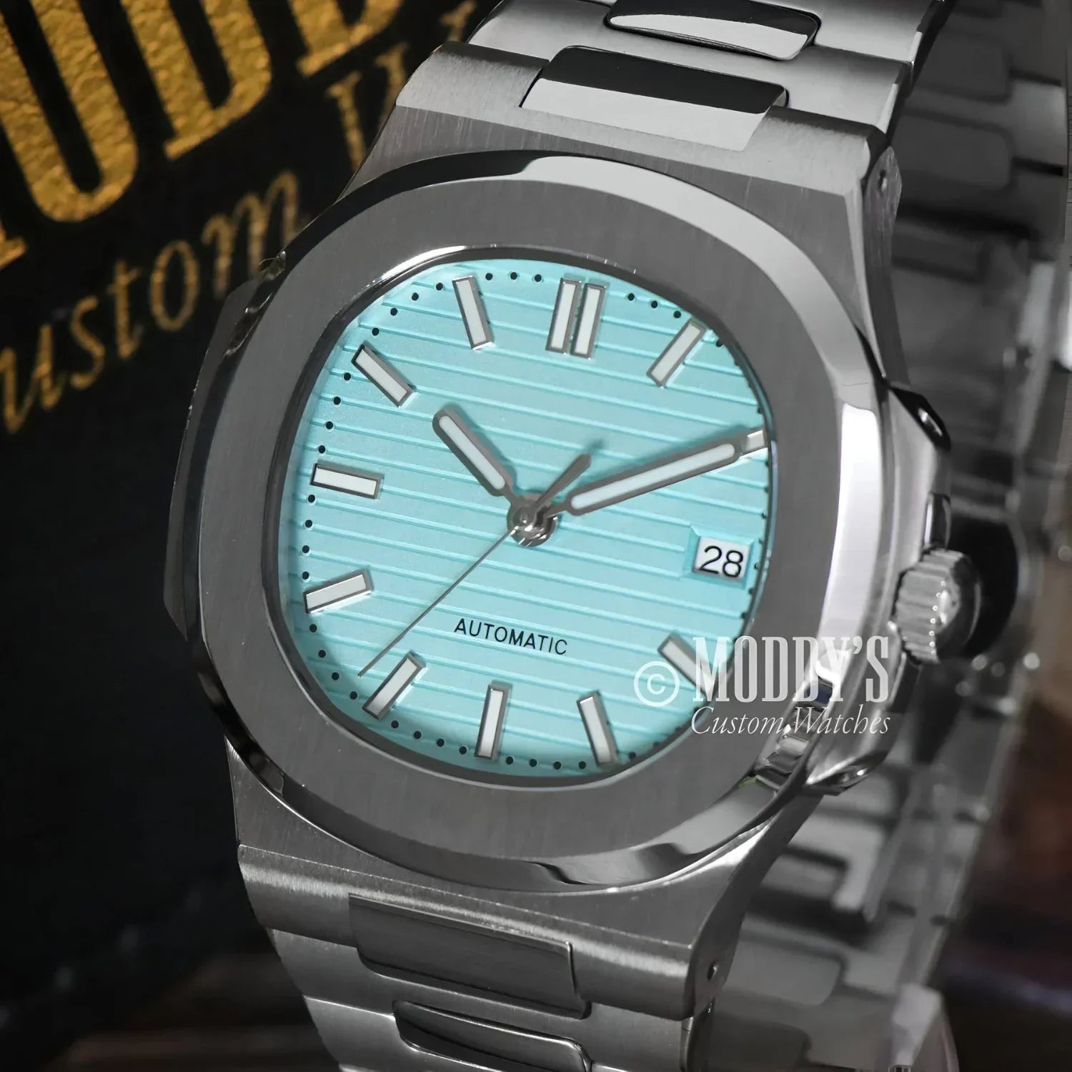Silver wristwatch with turquoise face, Nautiko in Tiffany Blue, featuring NH35 automatic movement