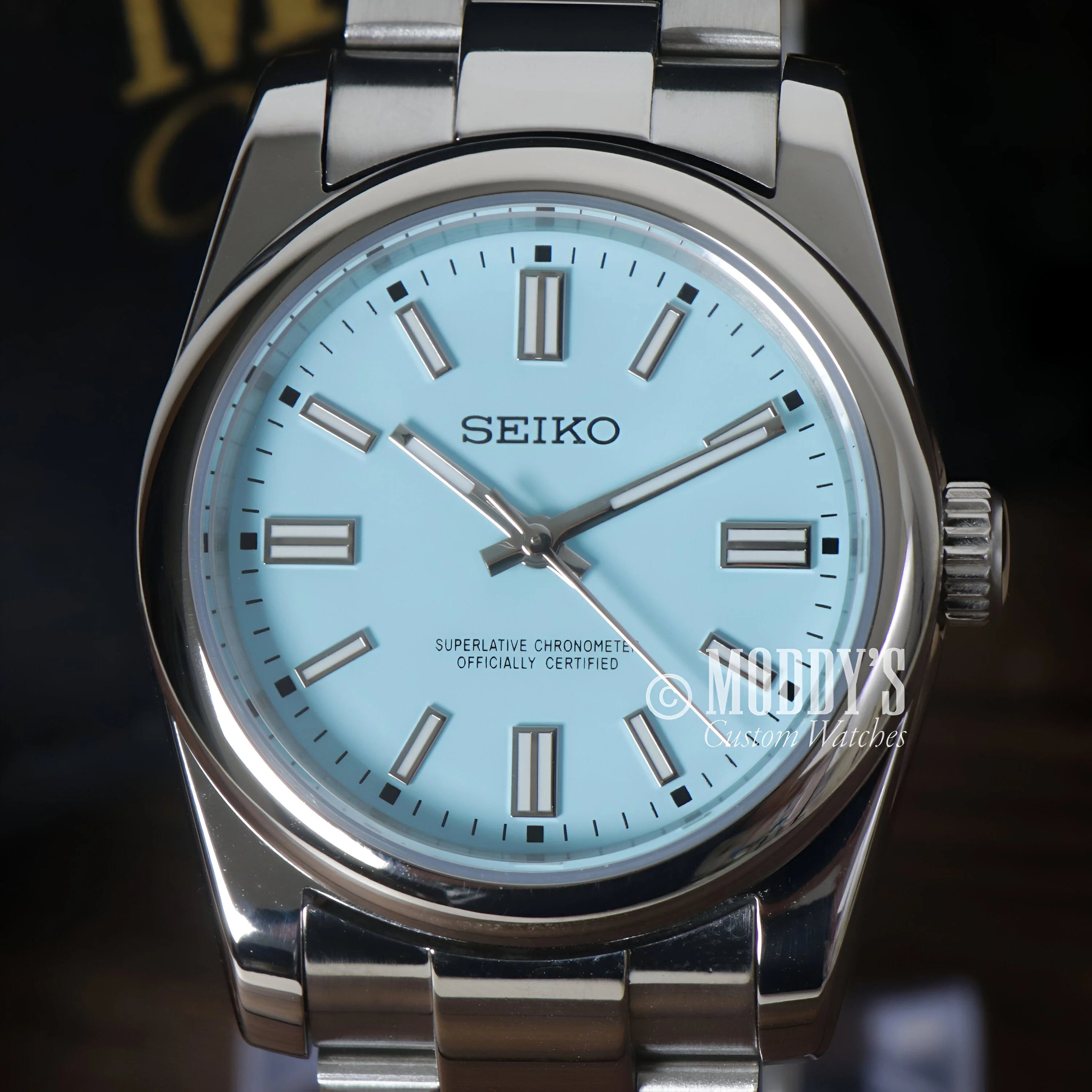 Seiko Mod Oyster watch featuring a light blue dial and stainless steel bracelet