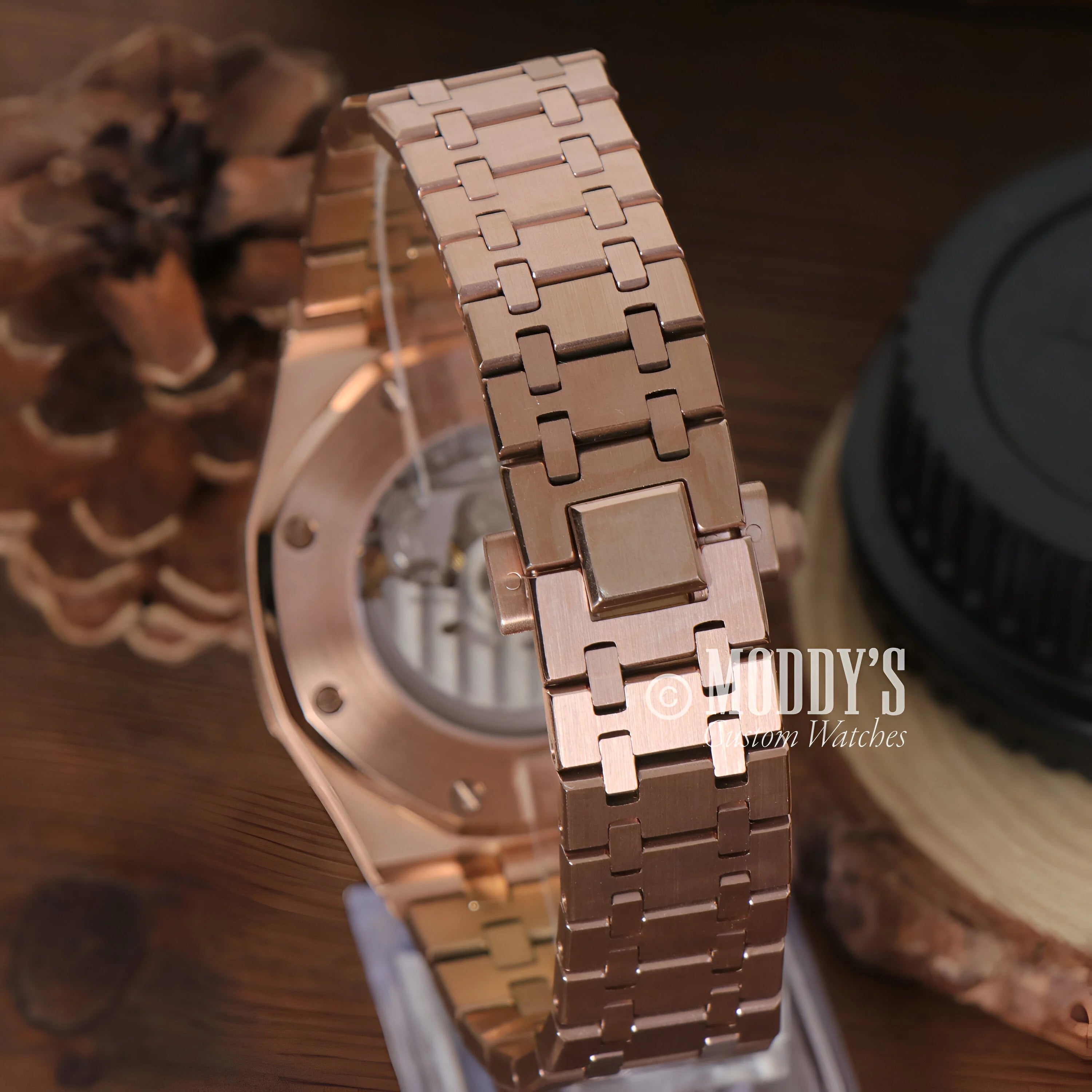 Rose Gold Metal Watch Bracelet For The Royal Seikoak Rose Gold Skeleton Displayed On a Stand