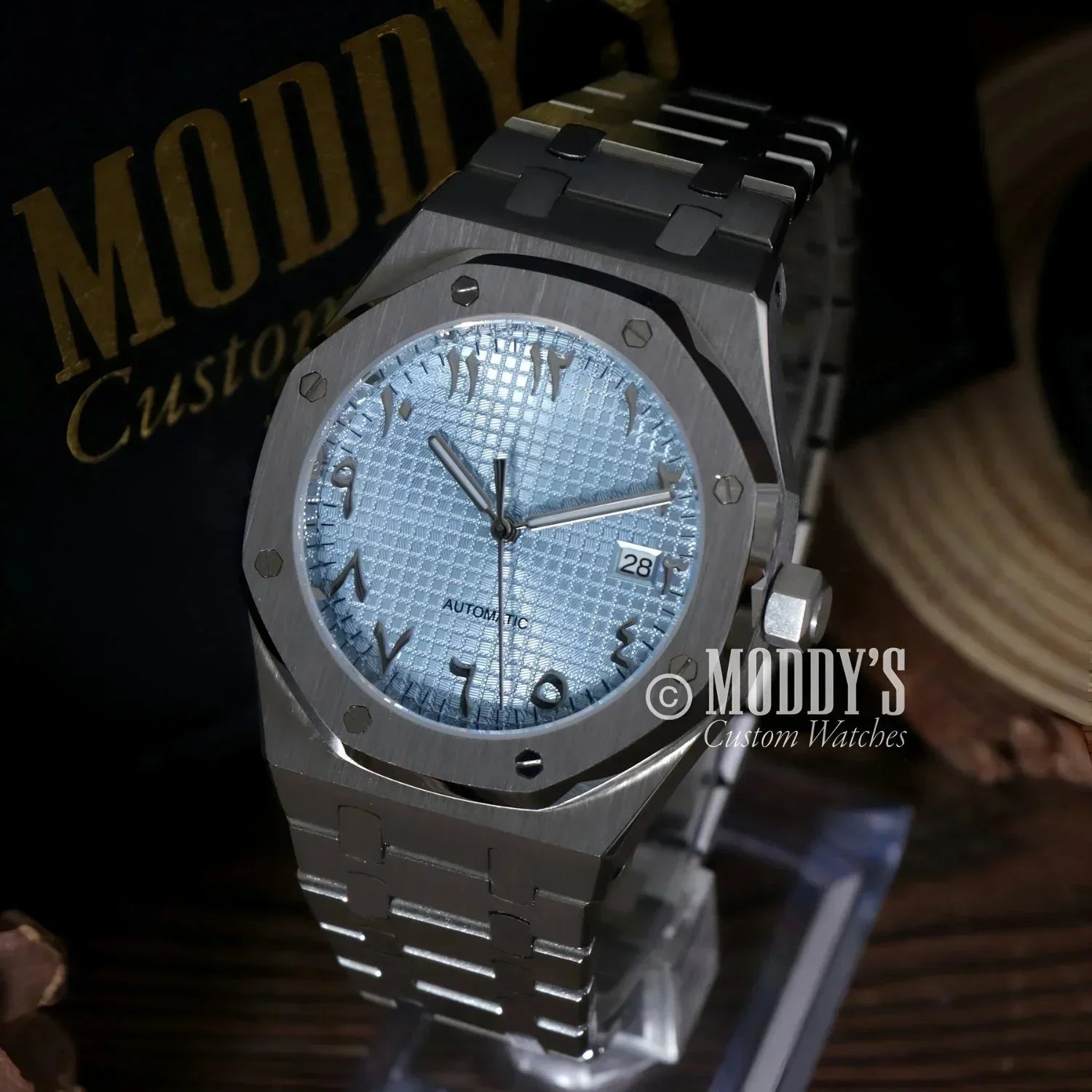 Silver-toned Royal Seikoak wristwatch with Arabic numerals and NH35 automatic movement