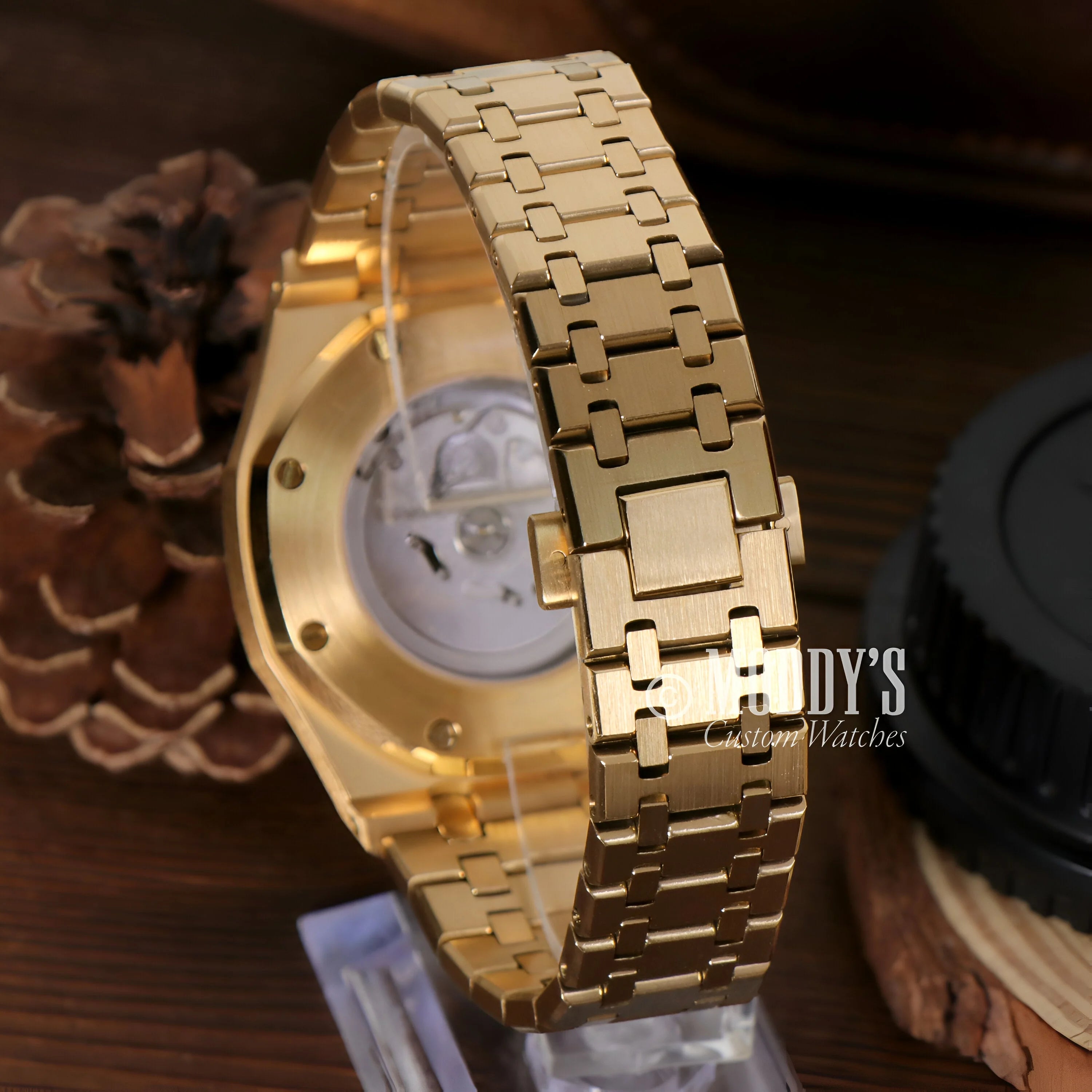 Gold-toned Royal Oak wristwatch with linked bracelet band, inspired by Seiko Mod Santos