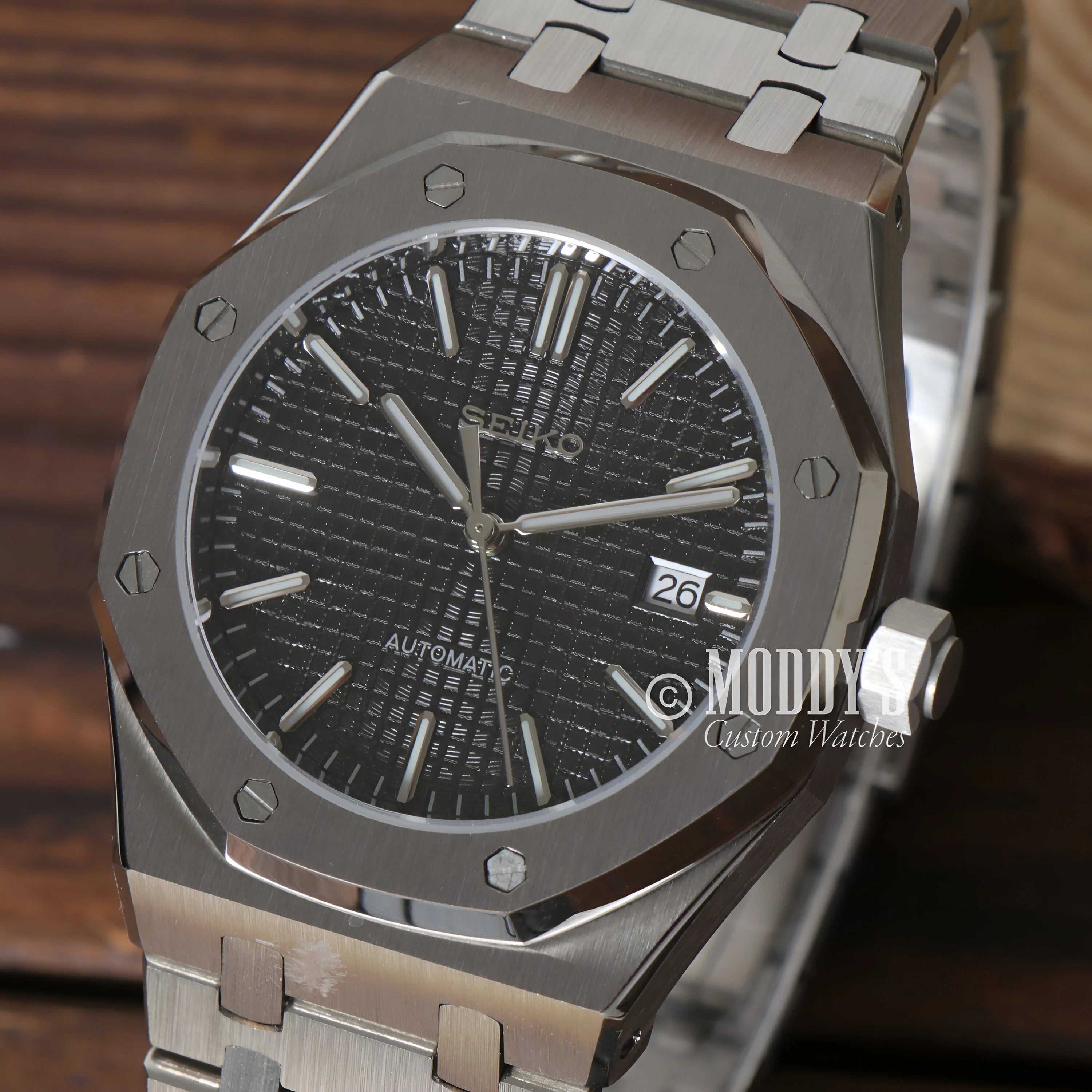 Stainless steel Audemars Piguet Royal Oak watch with black dial, octagonal bezel