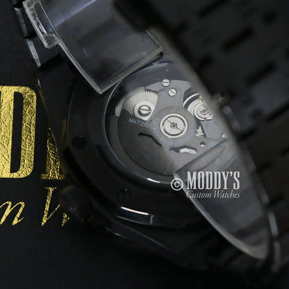 Black wristwatch showcasing movement, Royal Seikoak with Seiko NH72 automatic mechanism