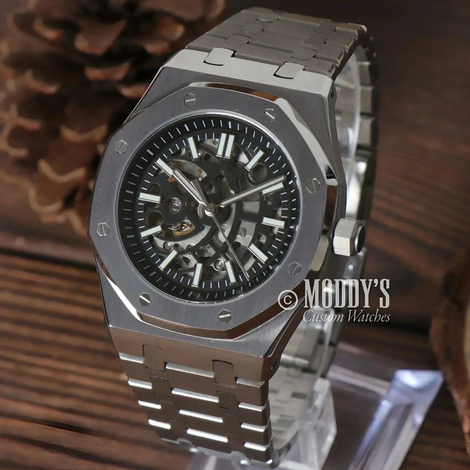 Silver skeleton-dial wristwatch from Royal Seikoak featuring Seiko NH70 automatic movement