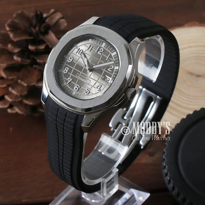 Silver Seikonaut wristwatch with black rubber strap and NH35 automatic movement