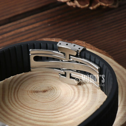 Black rubber watch band with silver clasp for Seikonaut, featuring Seiko NH35 movement