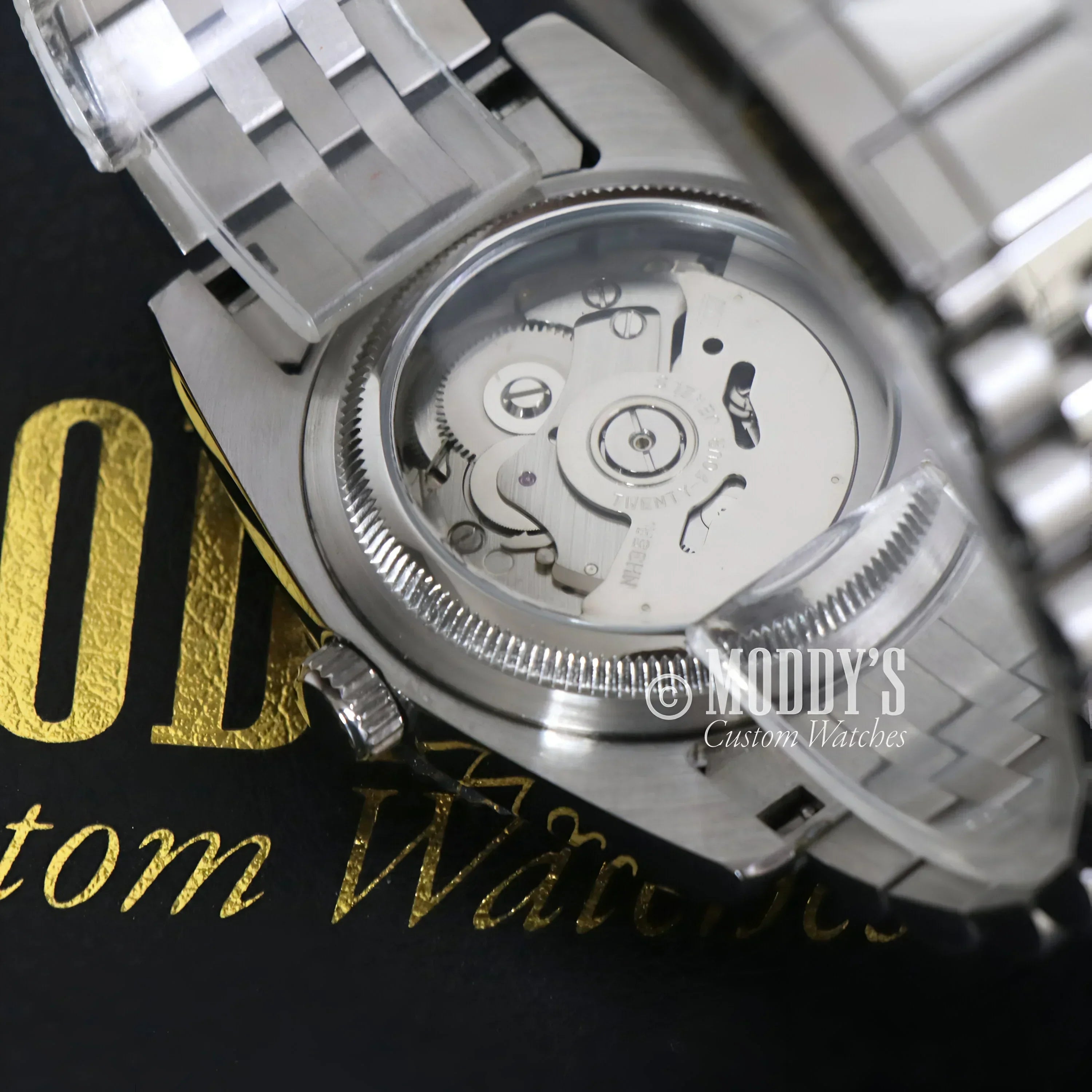 Silver automatic wristwatch from Seikojust featuring Arabic Royal Blue and Seiko NH35 Automatic