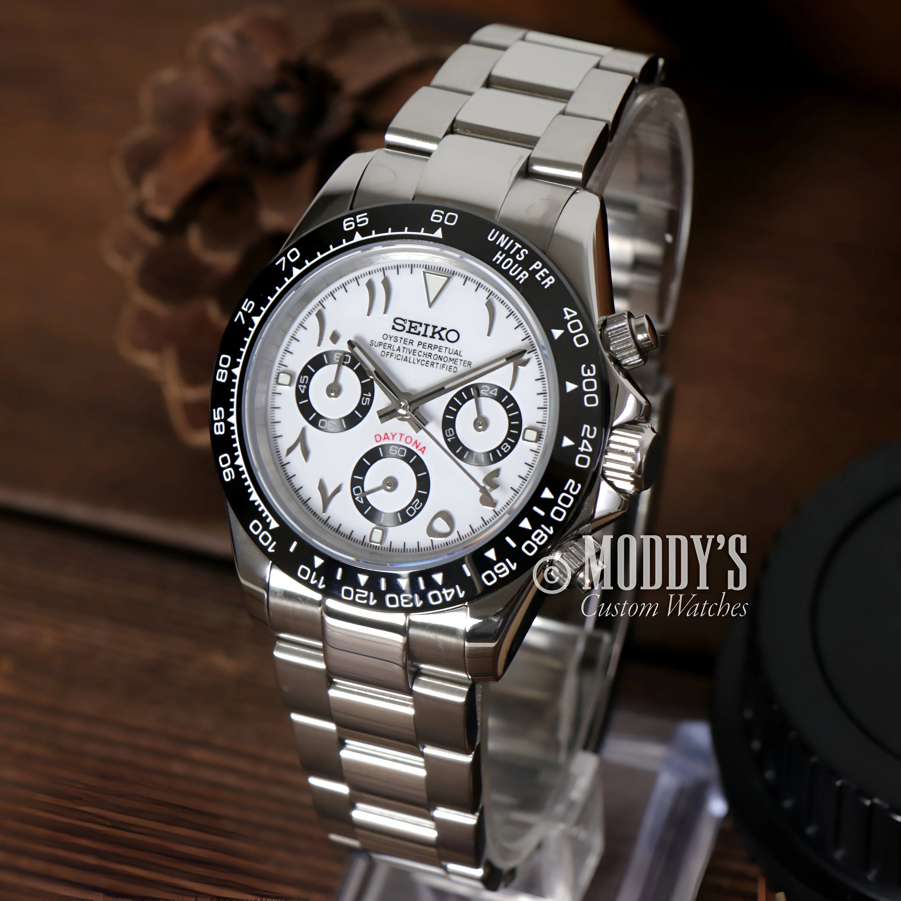 Seiko Mod Daytona Panda wristwatch with silver metal bracelet and black bezel