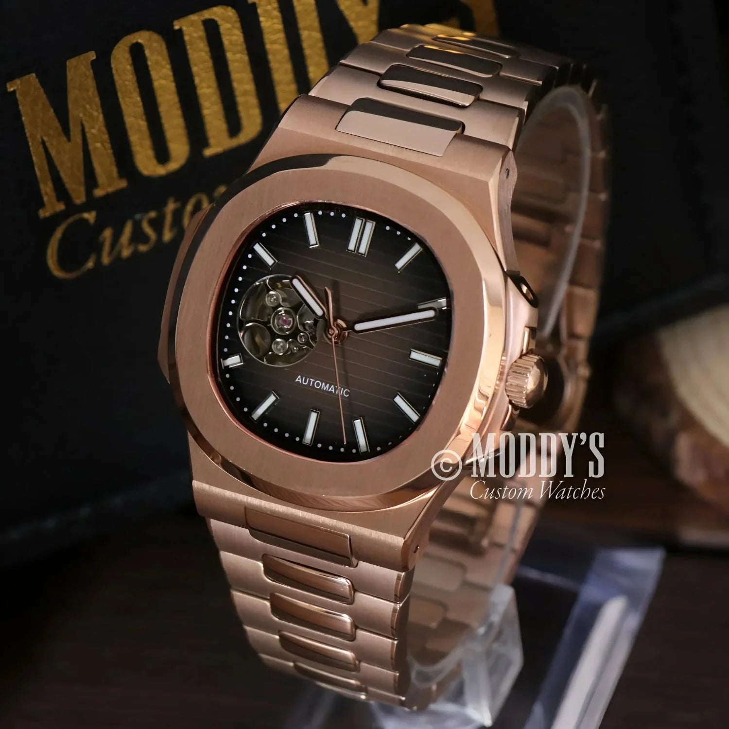 Rose gold automatic wristwatch Nautiko with chocolate open heart and 904L stainless steel