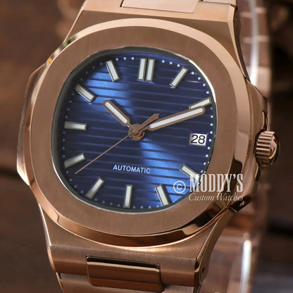 Rose gold wristwatch with blue face featuring NH35 automatic movement and 904L stainless steel