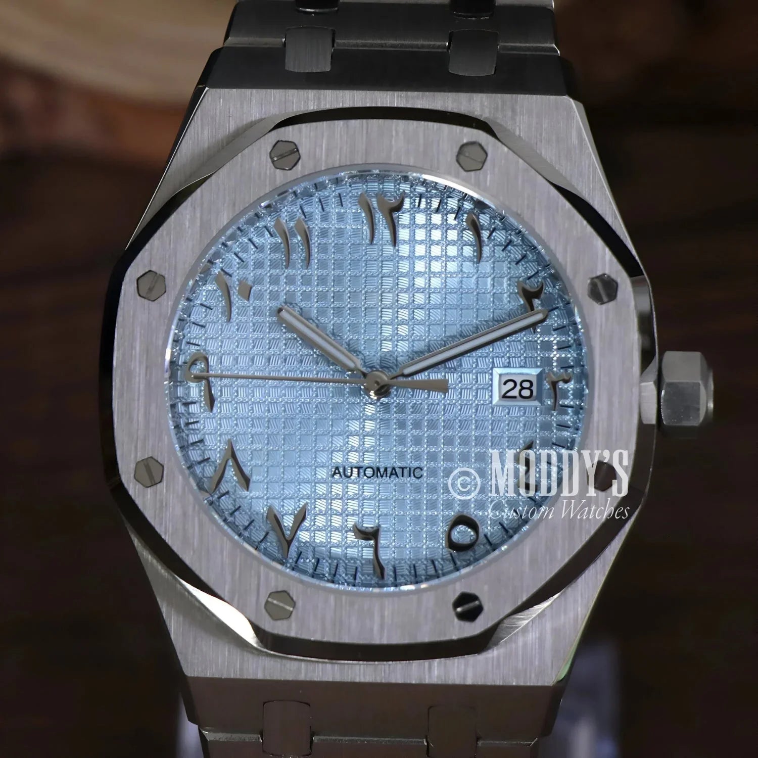 Silver wristwatch with Arabic numerals, Royal Seikoak featuring NH35 automatic movement