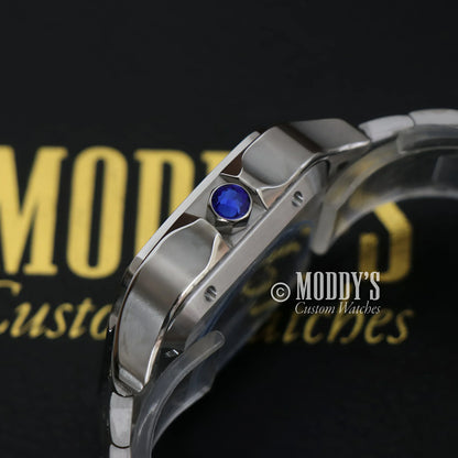 Silver wristwatch with blue cabochon featuring NH35 automatic movement in Arabic White design