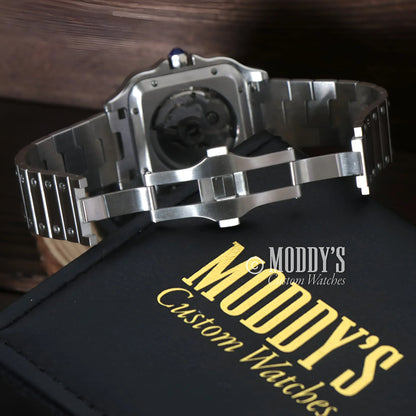 Silver wristwatch with metal band featuring NH70 automatic movement and 316L stainless steel