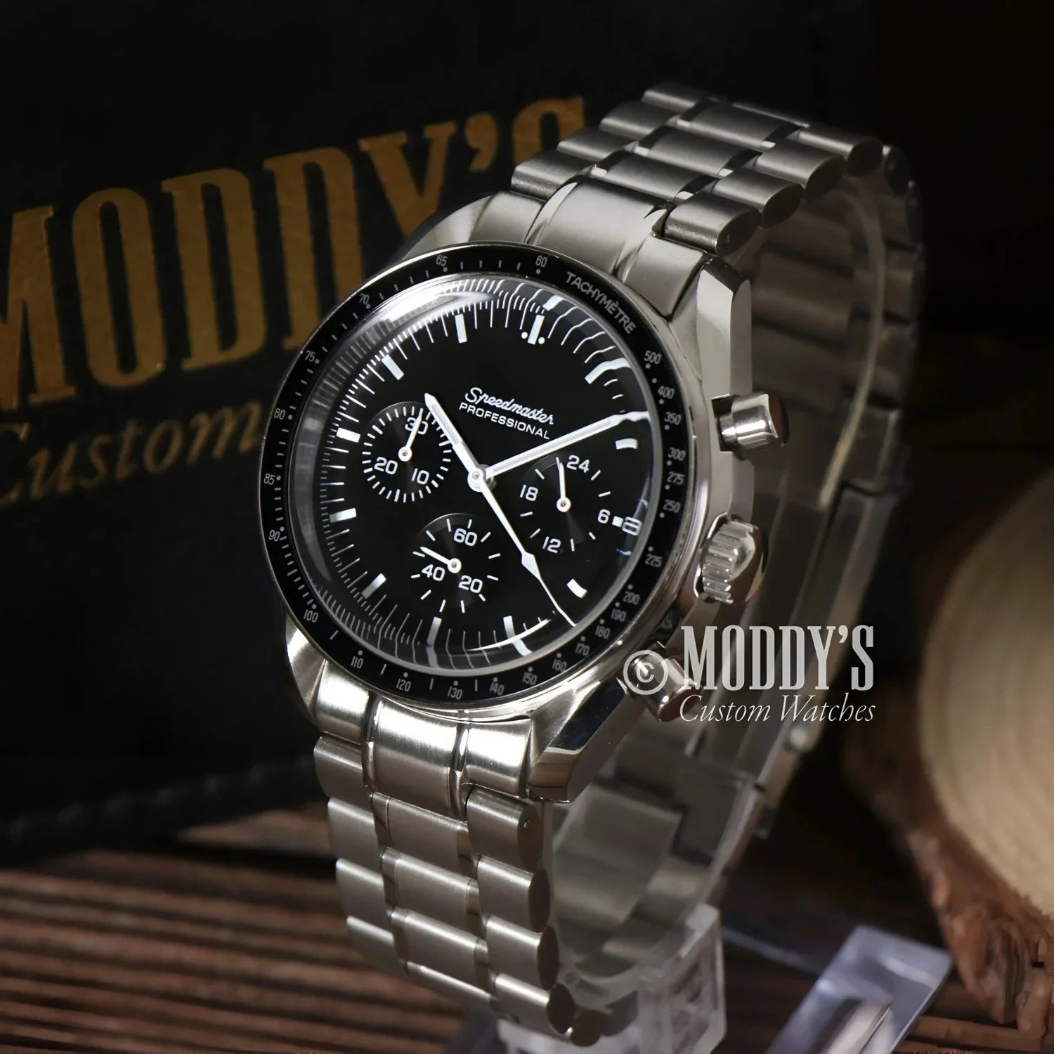Silver Speedmaster Professional wristwatch featuring Seiko VK63 hybrid movement in Speedseiko Black