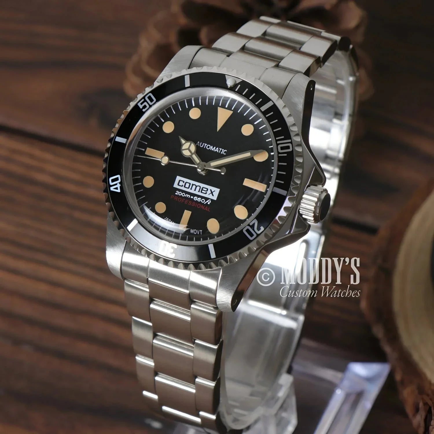 Silver wristwatch with black face, Seikomariner Vintage, featuring Seiko NH35 Automatic