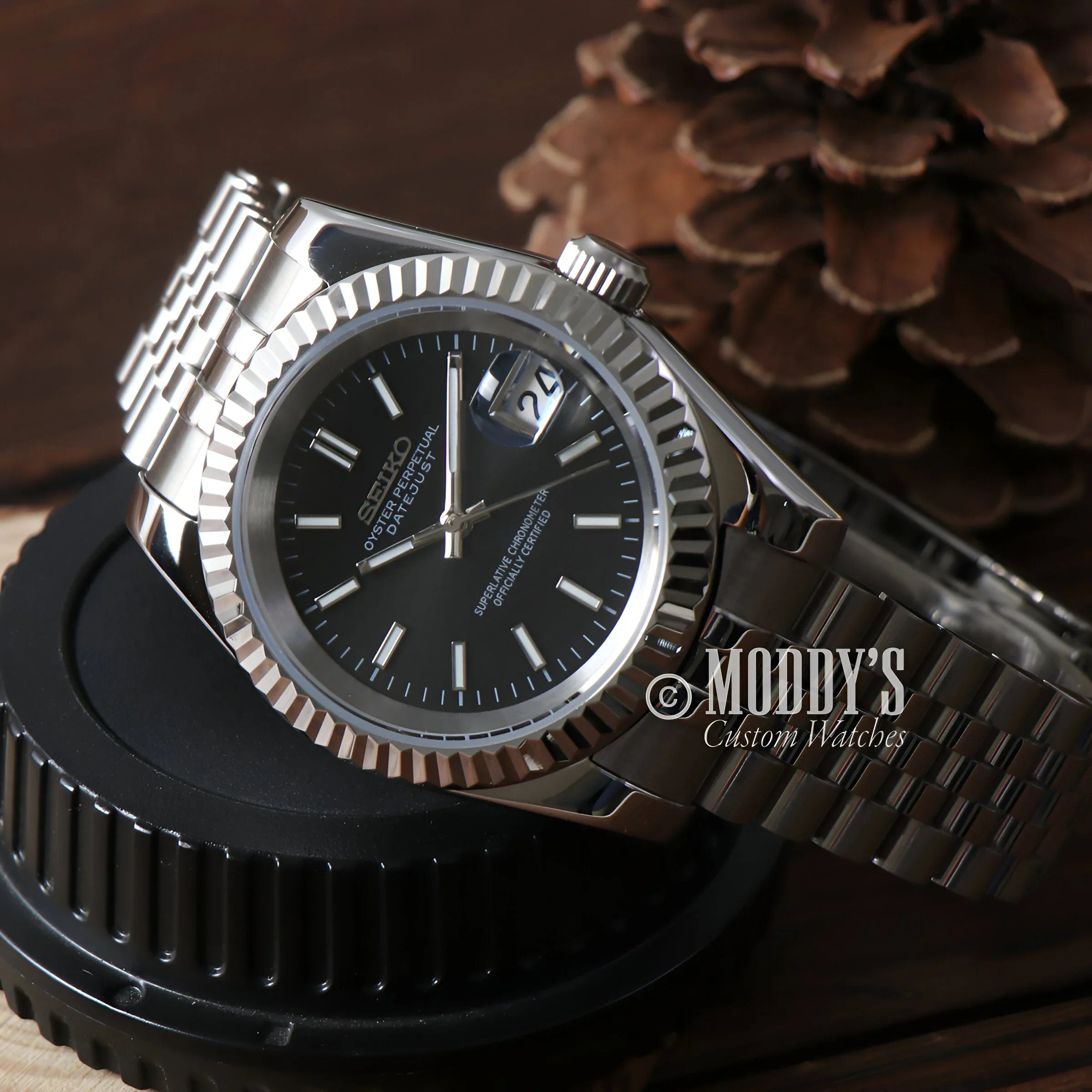 Seikojust Black Watch On a Black Stand, Sleek And Elegant Design, Perfect Datejust Choice