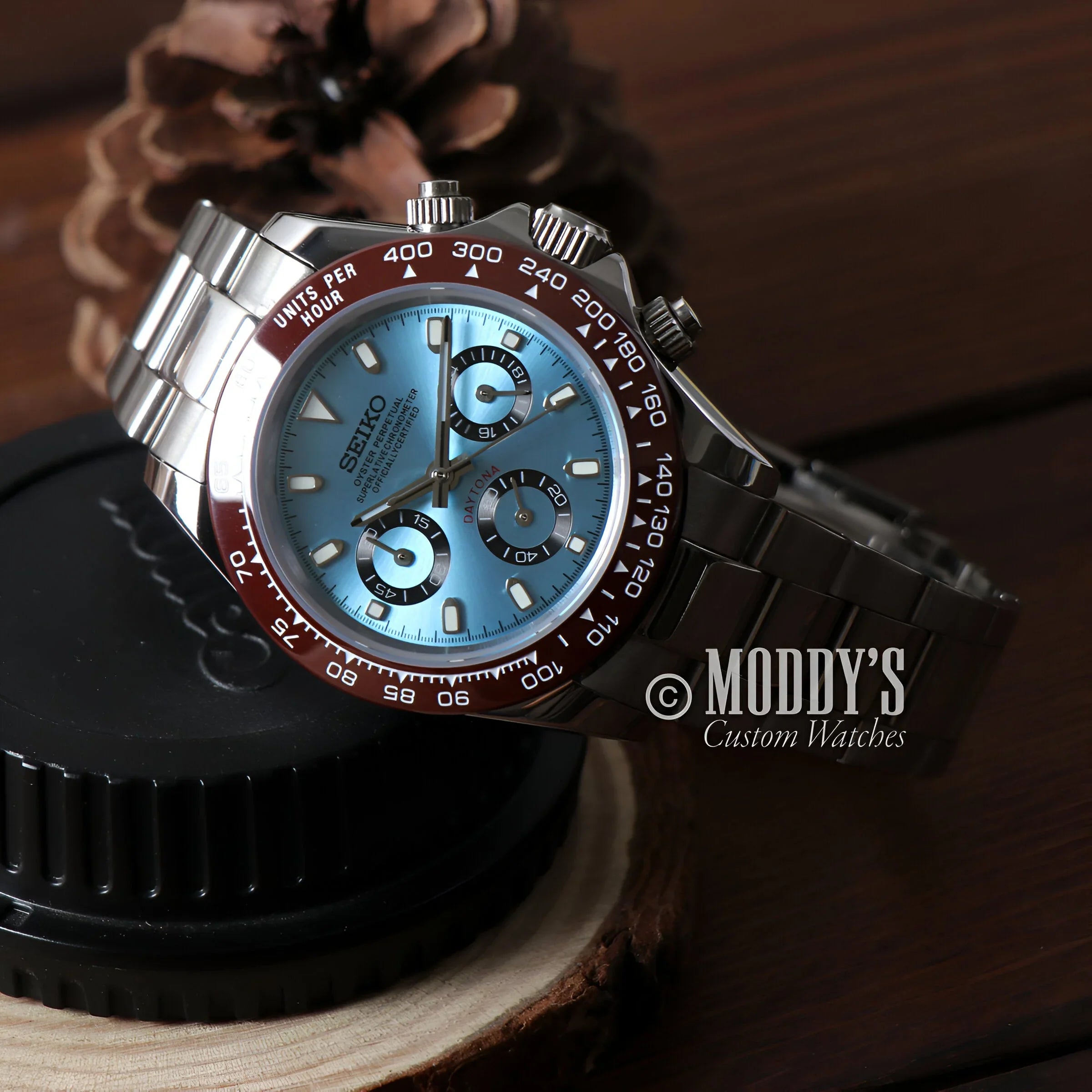 Seitona Platinum Watch With Blue Dial, Vk63 Hybrid Movement, On a Wooden Table