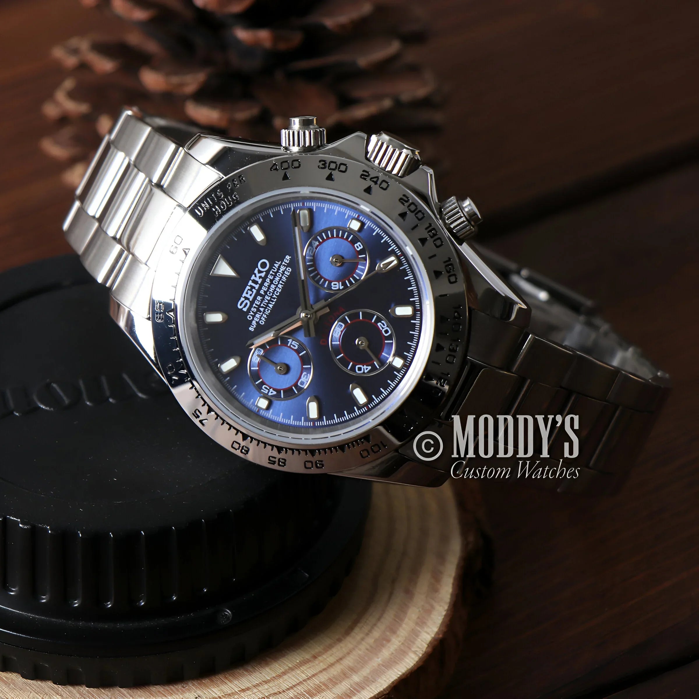 Seitona Silver-blue Hybrid Watch With Vk63 Movement On a Wooden Stand