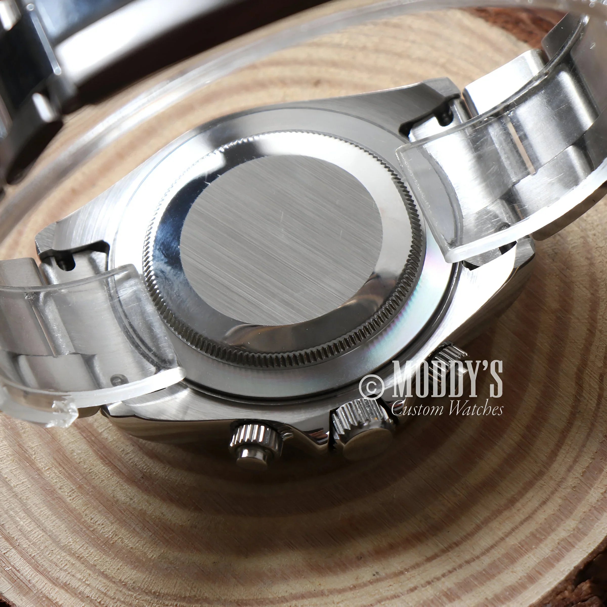 Seitona Platinum Watch On a Wooden Table, Showing Vk63 Hybrid Design