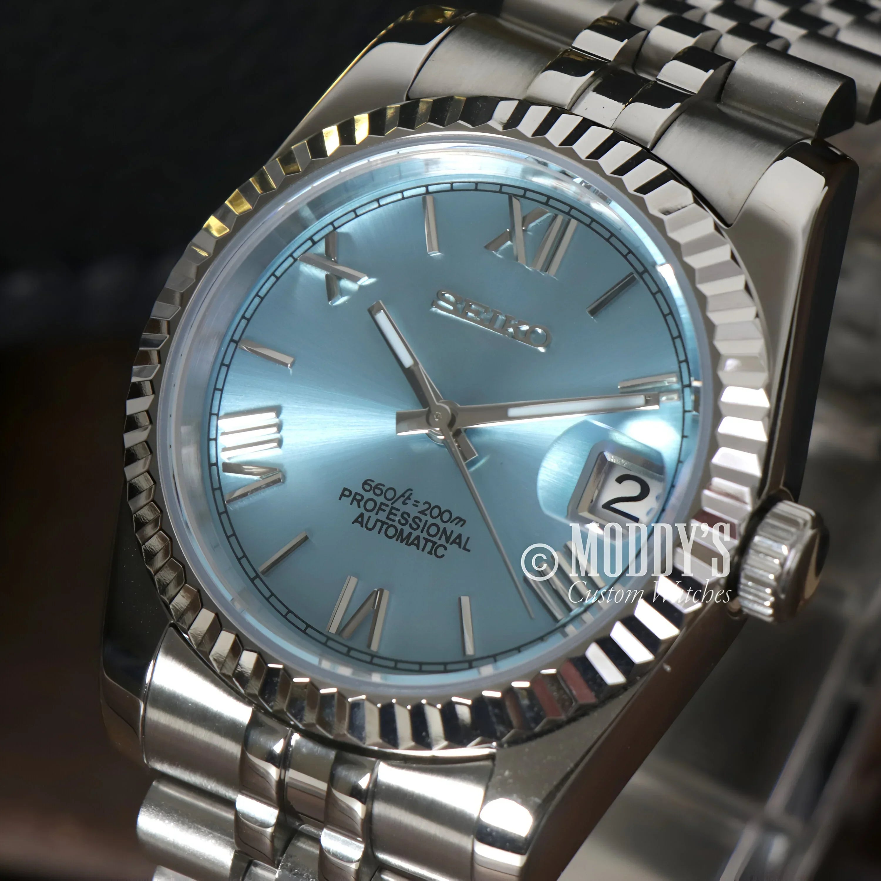 Silver-toned Seikojust Ice Blue Roman wristwatch with NH35 automatic movement