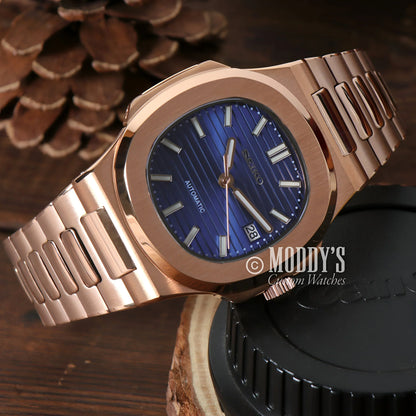 Rose Gold Seiko wristwatch with blue face featuring NH35 automatic movement and 904L stainless steel