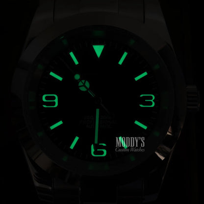 Luminous green Seiko NH35 automatic watch with oyster design and camo strap