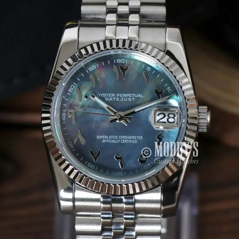 Silver Seikojust Arabic Cosmos wristwatch featuring Arabic numerals and Seiko NH35 Automatic