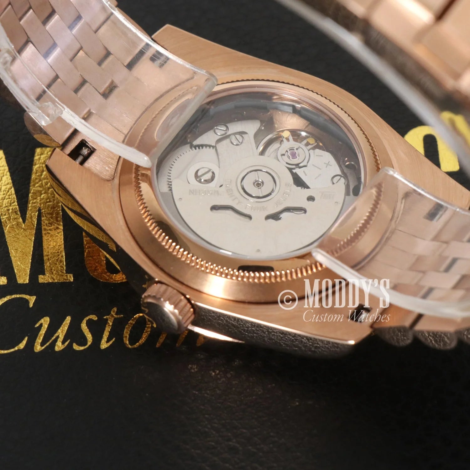 Rose gold Seikojust Chocolate Crystals watch with NH35 automatic movement visible