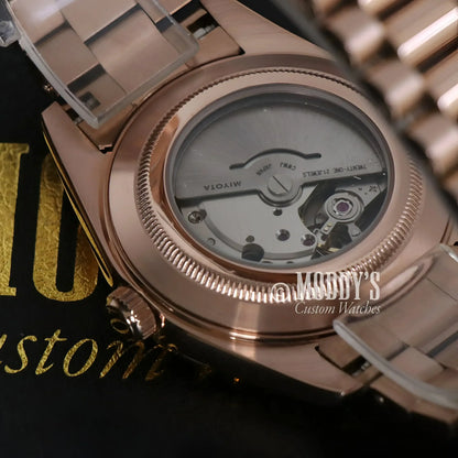 Rose gold Daydate watch with visible movement on 904L stainless steel by Seiko Mod