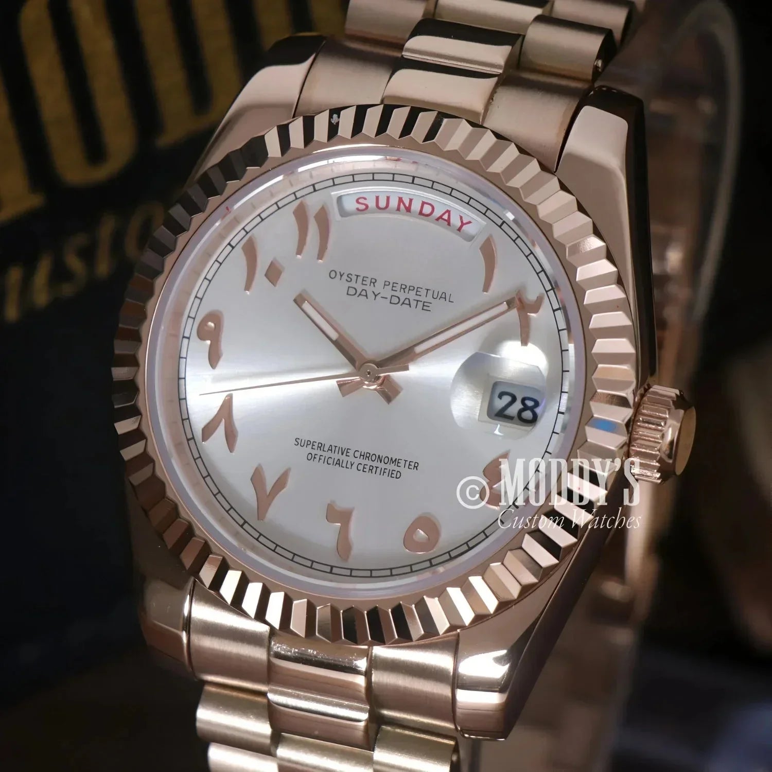 Rose gold wristwatch with Arabic numerals, Seikojust Daydate Rose Gold in 904L stainless steel