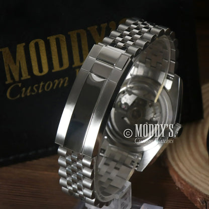 Silver metal Seikojust watch with green Roman dial and NH35 automatic movement