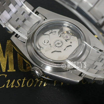 Silver wristwatch with NH35 automatic movement in Seikojust Green Roman design