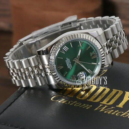Silver wristwatch with green face from Seikojust featuring NH35 automatic movement