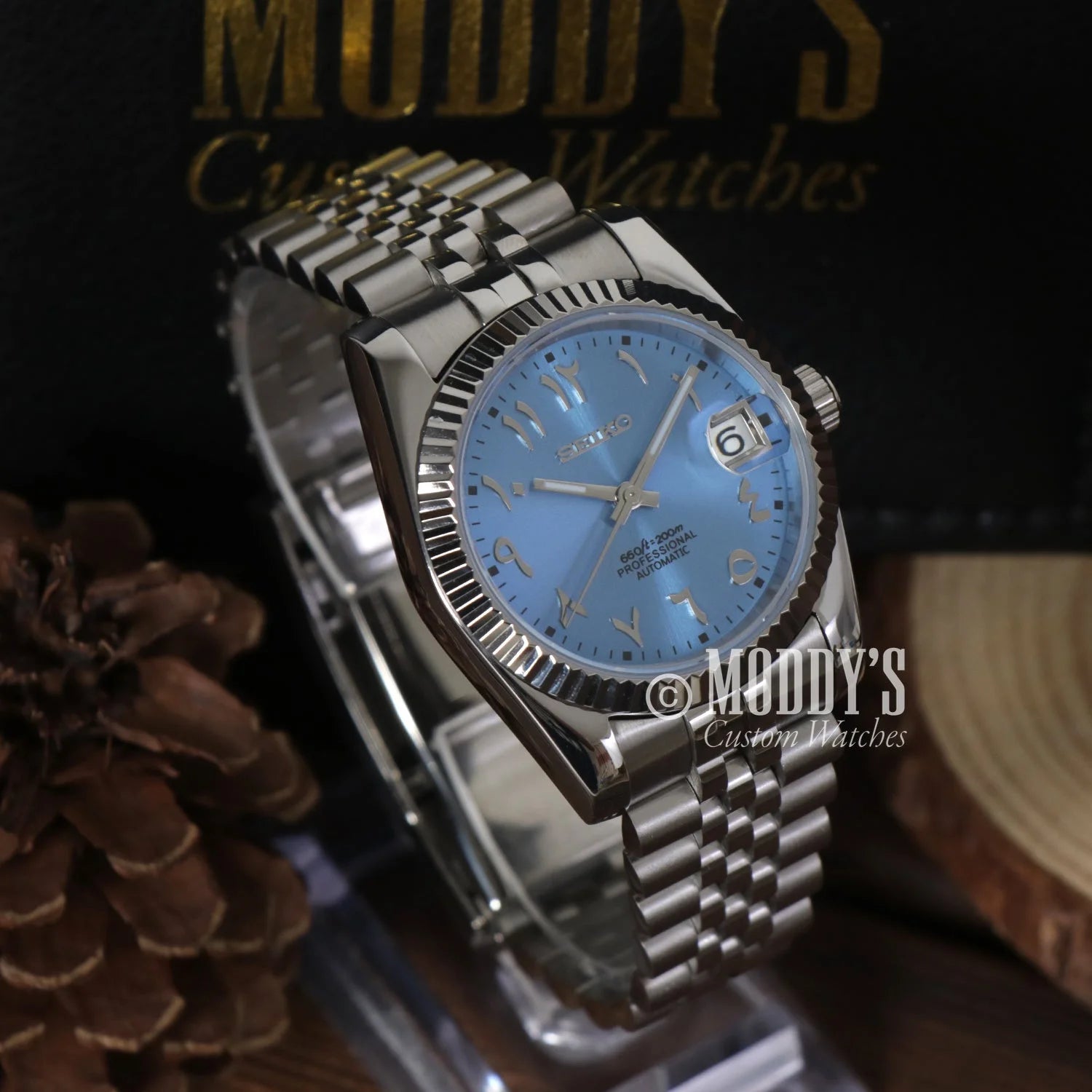 Stainless steel Seikojust Ice Blue Arabic wristwatch with fluted bezel and light blue dial