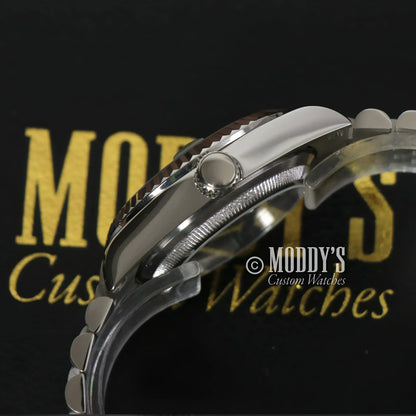 Silver Seikojust Ice Blue Roman wristwatch with rotating bezel and NH35 automatic movement