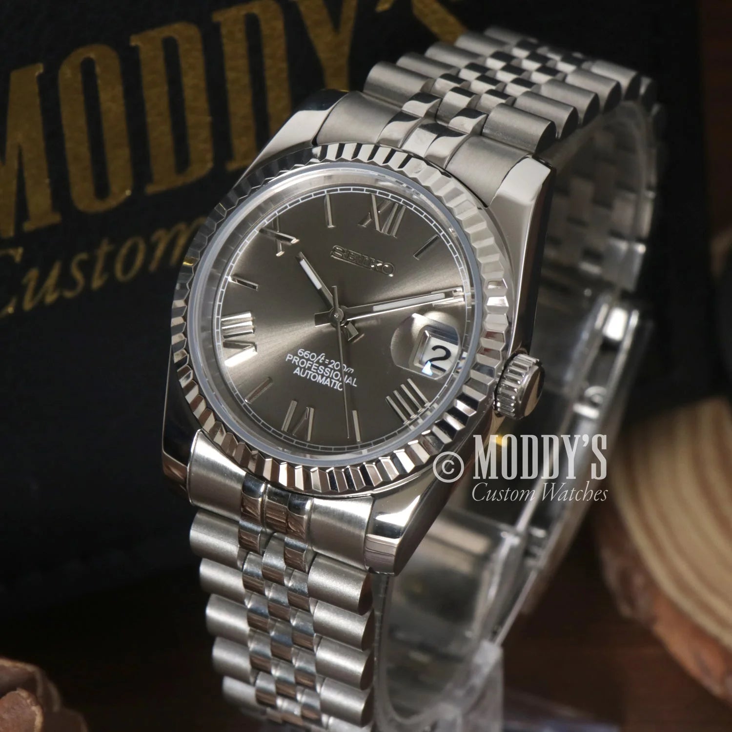 Silver Rolex Datejust watch with fluted bezel on Seikojust Roman Champagne, NH35 automatic