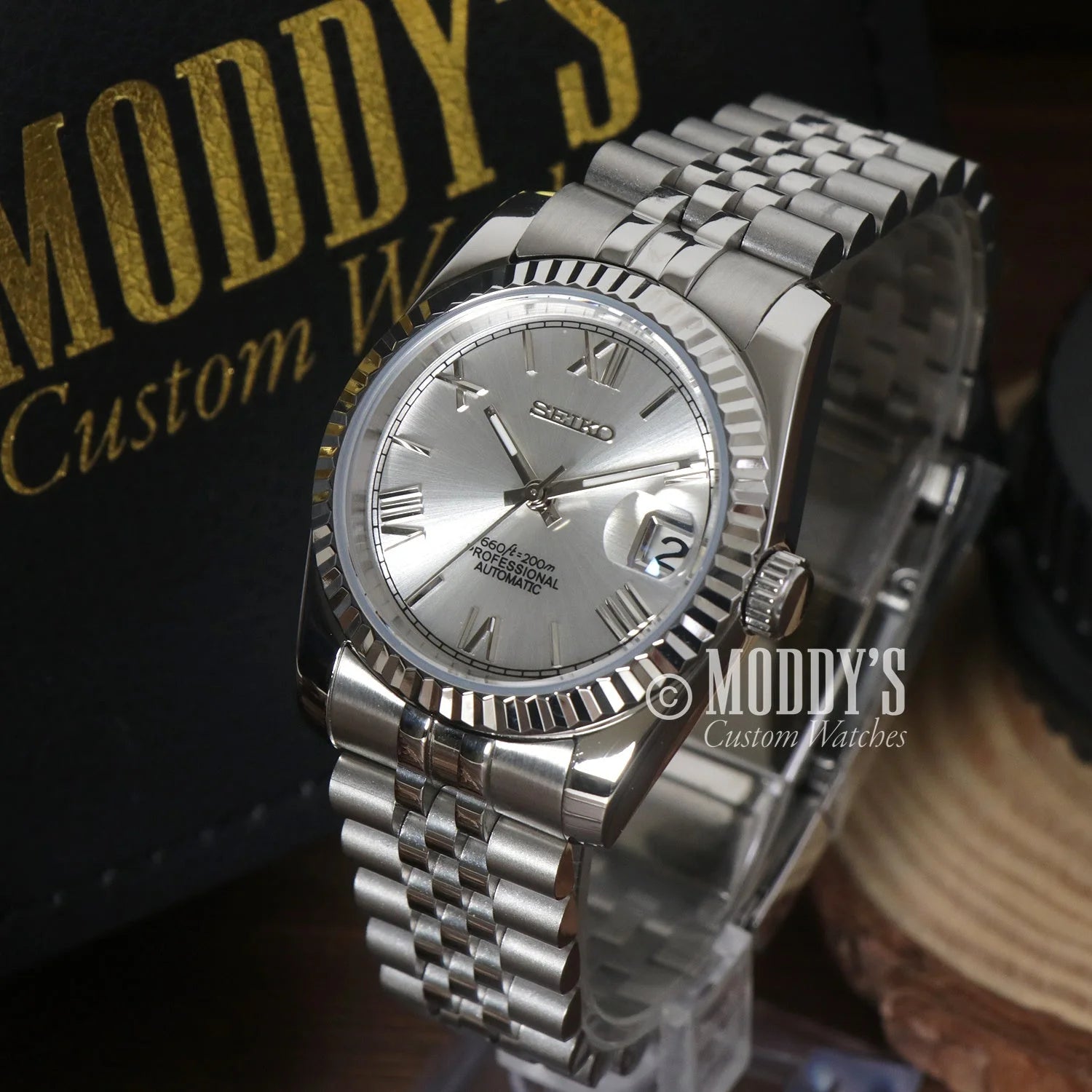 Silver-toned luxury Seiko Mod Datejust wristwatch with fluted bezel and jubilee bracelet