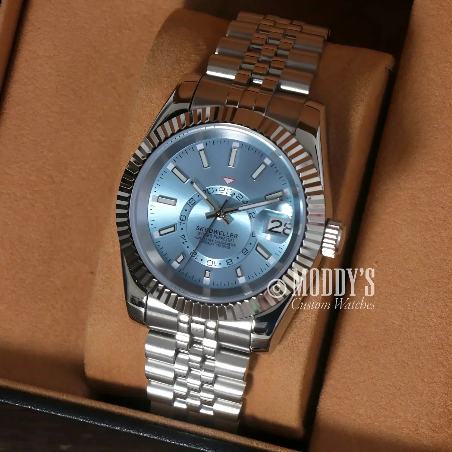 Silver wristwatch with light blue face, Seiko NH35 automatic, Sky Dweller Ice Blue