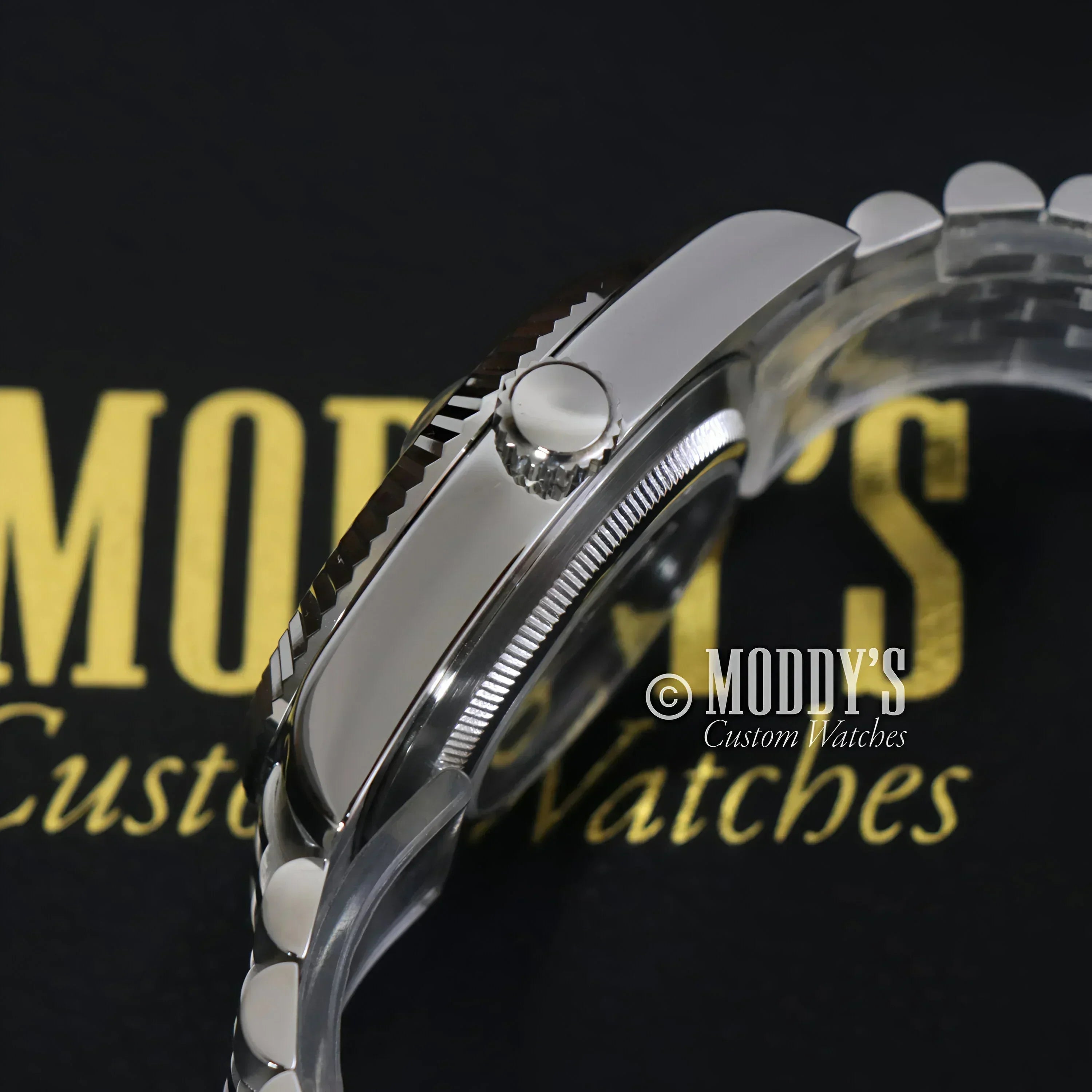 Silver wristwatch with fluted bezel from Seikojust Sky Dweller Ice Blue collection