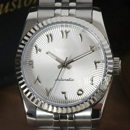 Silver Seikojust watch with Arabic numerals and NH35 automatic movement