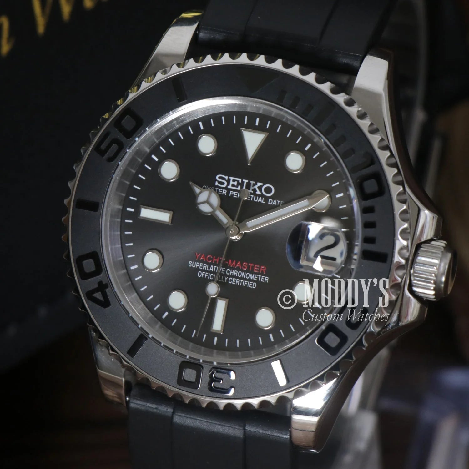 Seiko Marine Black dive watch with black dial and silver case, perfect for Seiko mod enthusiasts