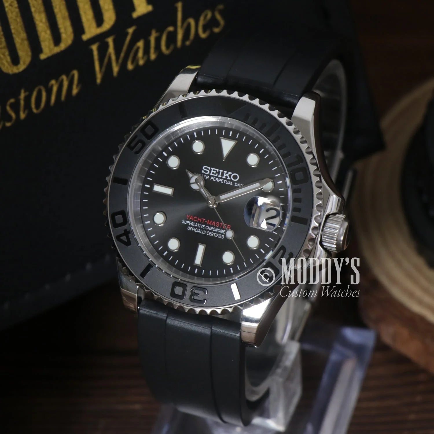 Seiko dive watch with black dial, bezel, and rubber strap from Seikomarine Black collection