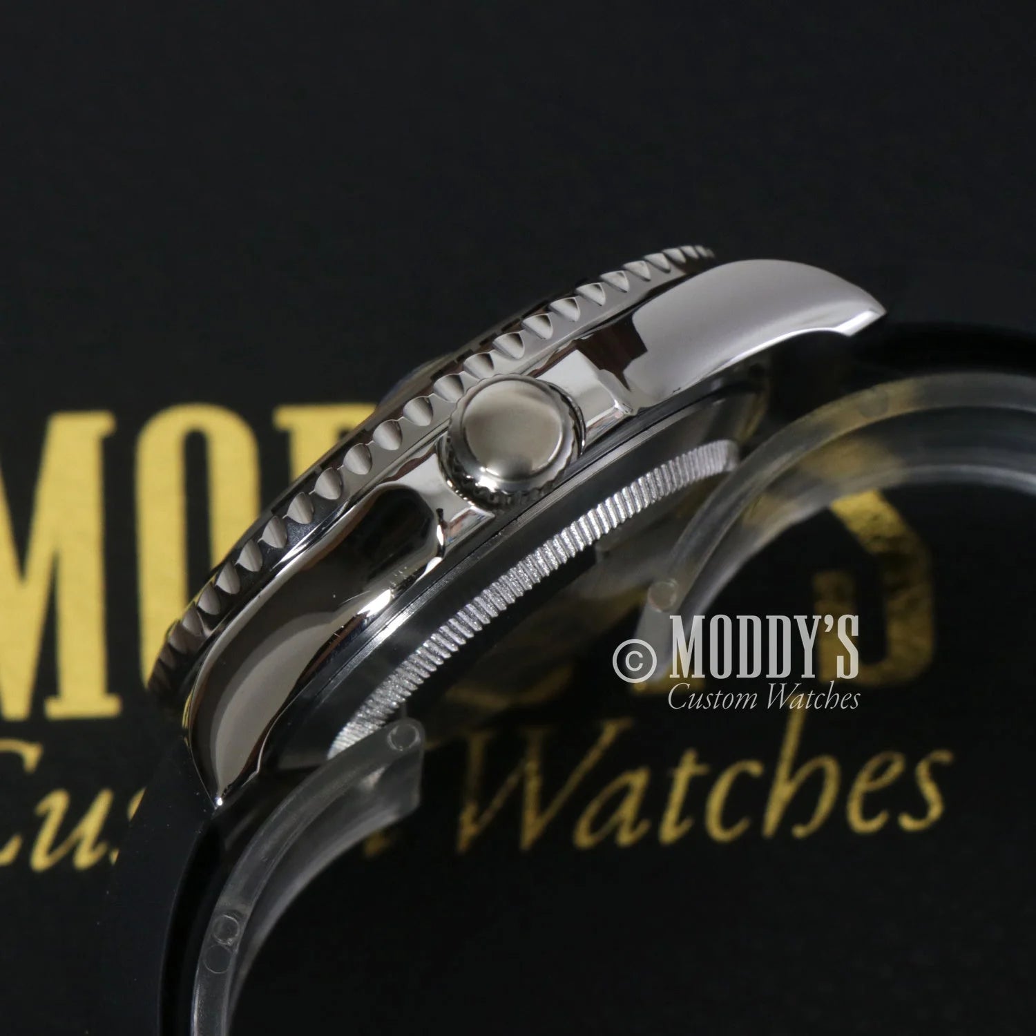 Side view of Seikomarine Black stainless steel watch case highlighting crown and bezel